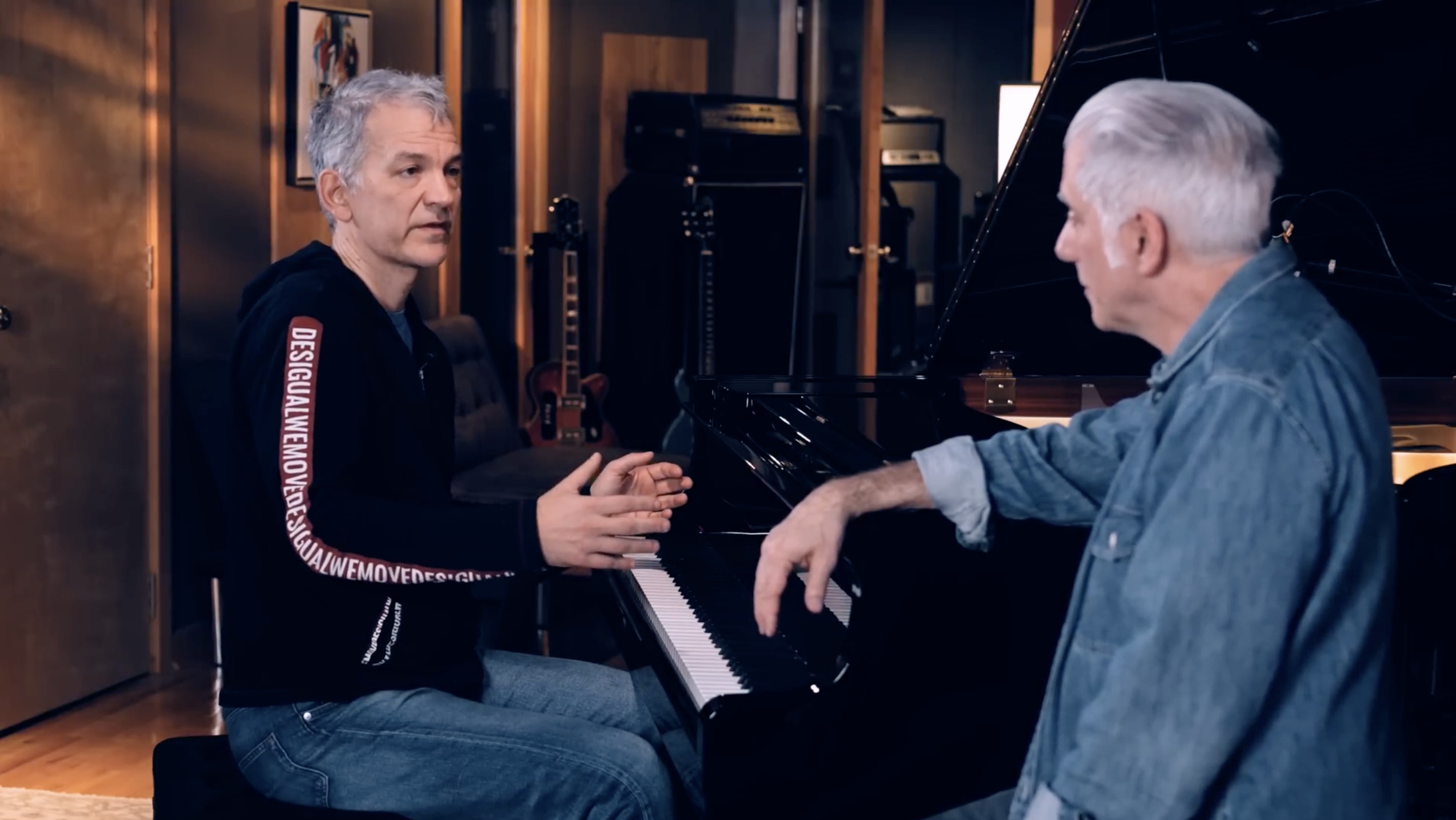 Rick Beato watches as Keith Jarrett improvises over a tune with his right hand